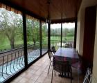 Image - Terrasse avec véranda.